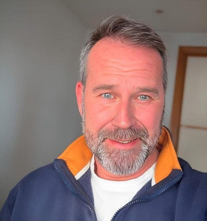 Customer photo — device on shoulder